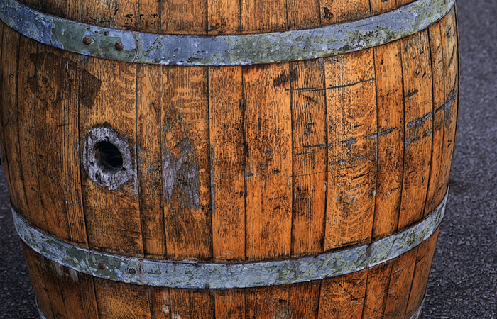 DIY bourbon barrel floor - rustic. 