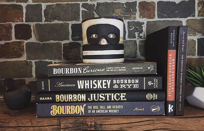 Whiskey Guide - what huge stack of whiskey books!