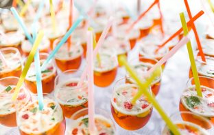 Why Have a National Rum Punch Day? Glasses of rum punch line up for National Rum Punch Day on September 20.